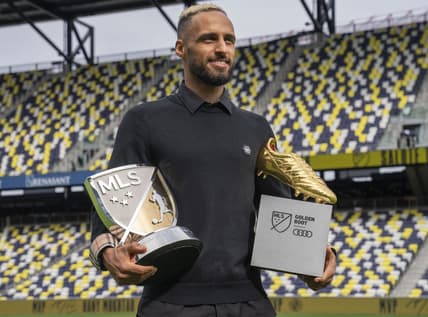 Nov 1, 2022; Nashville, Tennessee, USA;Nashville SC's Hany Mukhtar holds his Landon Donovan MLS MVP and his MLS Golden Boot awards as he poses for a portrait at Geodis Park.  Mandatory Credit: George Walker IV - USA TODAY Sports