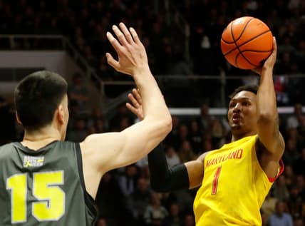 Purdue Boilermakers center Zach Edey (15) defends the shot of Maryland Terrapins guard Jahmir Young (1) during the NCAA men   s basketball game, Sunday, Jan. 22, 2023, at Mackey Arena in West Lafayette, Ind. Purdue won 58-55.

Purmary012223 Am08521