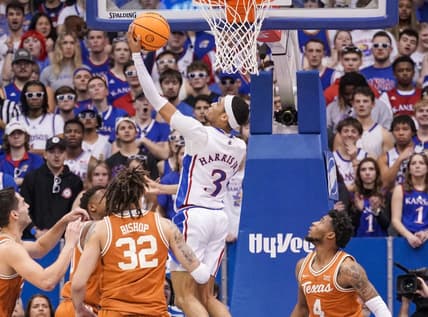 Feb 6, 2023; Lawrence, Kansas, USA; Kansas Jayhawks guard Dajuan Harris Jr. (3) shoots a layup against the Texas Longhorns during the first half at Allen Fieldhouse. Mandatory Credit: Denny Medley-USA TODAY Sports