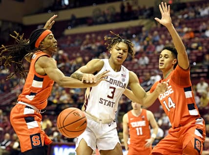 Feb 8, 2023; Tallahassee, Florida, USA; Syracuse Orange center Jesse Edwards (14) and forward Maliq Brown (1) pressure Florida State Seminoles guard Cameron Corhen (3) during the first half at Donald L. Tucker Center. Mandatory Credit: Melina Myers-USA TODAY Sports