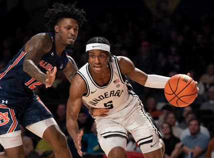 Vanderbilt guard Ezra Manjon (5) drives past Auburn guard Zep Jasper (12) during the first half at Memorial Gymnasium Saturday, Feb. 18, 2023, in Nashville, Tenn.

Ncaa Basketball Auburn At Vanderbilt