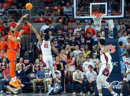 Auburn Tigers forward Johni Broome (4) shoots a hook shot as Auburn Tigers take on Ole Miss Rebels at Neville Arena in Auburn, Ala., on Wednesday, Feb. 22, 2023.