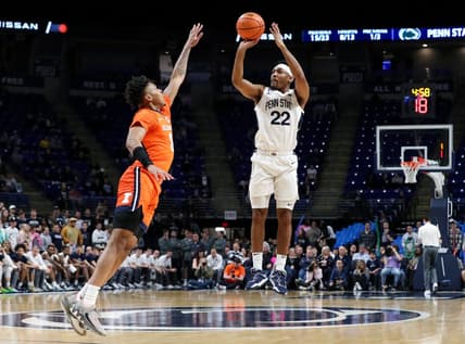 Feb 14, 2023; University Park, Pennsylvania, USA; Penn State Nittany Lions guard Jalen Pickett (22) shoots the ball as Illinois Fighting Illini guard Terrence Shannon Jr (0) defends during the first half at Bryce Jordan Center. Penn State defeated Illinois 93-81. Mandatory Credit: Matthew OHaren-USA TODAY Sports