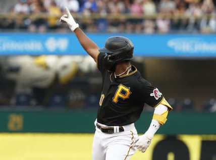 Aug 1, 2023; Pittsburgh, Pennsylvania, USA;  Pittsburgh Pirates second baseman Liover Peguero (60) reacts on a two run home run against the Detroit Tigers during the second inning at PNC Park. Mandatory Credit: Charles LeClaire-USA TODAY Sports