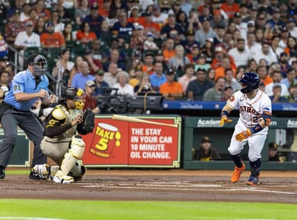 Sep 9, 2023; Houston, Texas, USA; Houston Astros second baseman Jose Altuve (27) throws his bat after he thought he was walked. Instead home plate umpire Quinn Wolcott called him out on strikes in the first inning at Minute Maid Park. Mandatory Credit: Thomas Shea-USA TODAY Sports