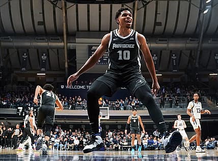 Dec 29, 2022; Indianapolis, Indiana, USA;  Providence Friars guard Noah Locke (10) celebrates after a dunk by Providence Friars guard Devin Carter (22) against the Butler Bulldogs during the first half at Hinkle Fieldhouse. Mandatory Credit: Robert Goddin-USA TODAY Sports
