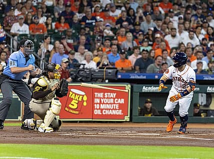 Sep 9, 2023; Houston, Texas, USA; Houston Astros second baseman Jose Altuve (27) throws his bat after he thought he was walked. Instead home plate umpire Quinn Wolcott called him out on strikes in the first inning at Minute Maid Park. Mandatory Credit: Thomas Shea-USA TODAY Sports