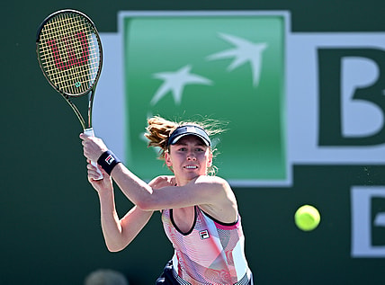 Mar 11, 2022; Indian Wells, CA, USA; Ekaterina Alexandrova (RUS) hits a shot in her 2nd round match against Simona Halep (ROU) at the BNP Paribas Open at the Indian Wells Tennis Garden. Mandatory Credit: Jayne Kamin-Oncea-USA TODAY Sports