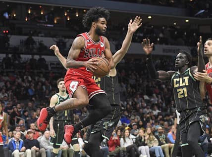 Jan 26, 2023; Charlotte, North Carolina, USA;  Chicago Bulls guard Coby White (0) looks to pass during the second half against the Charlotte Hornets at the Spectrum Center. Mandatory Credit: Sam Sharpe-USA TODAY Sports