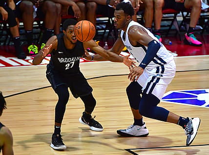 Aug 9, 2021; Las Vegas, Nevada, USA; Memphis Grizzlies center Xavier Tillman (2) knocks the ball away from Brooklyn Nets guard Brandon Knight (27) during an NBA Summer League game at Cox Pavilion. Mandatory Credit: Stephen R. Sylvanie-USA TODAY Sports