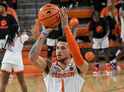 Clemson junior guard Chase Hunter (1) participates in a three-point competition during Rock the John basketball season kickoff event at Littlejohn Coliseum in Clemson, S.C. Thursday, October 27, 2022.

Rock The John Basketball Season Kickoff Event