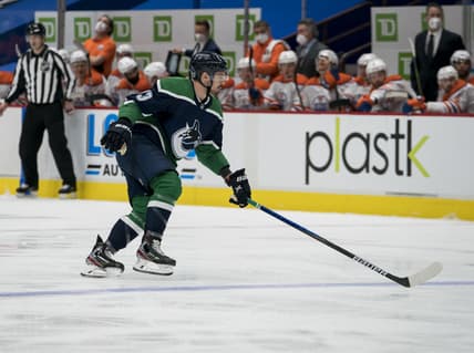 Feb 25, 2021; Vancouver, British Columbia, CAN; Vancouver Canucks forward Jayce Hawryluk  (13) skates against the Edmonton Oilers in the second period at Rogers Arena. Mandatory Credit: Bob Frid-USA TODAY Sports