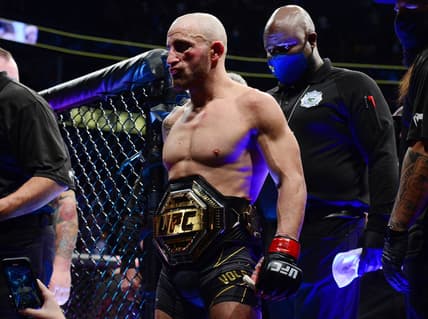 Sep 25, 2021; Las Vegas, Nevada, USA; Alexander Volkanovski reacts following his victory and title defense against Brian Ortega during UFC 266 at T-Mobile Arena. Mandatory Credit: Gary A. Vasquez-USA TODAY Sports