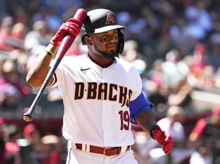 Apr 13, 2022; Phoenix, Arizona, USA; Arizona Diamondbacks Yonny Hernandez (19) hits his helmet after swinging at strike two against the Houston Astros in the third inning at Chase Field. Mandatory Credit: Rob Schumacher-Arizona Republic