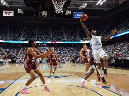Mar 8, 2023; Greensboro, NC, USA; North Carolina Tar Heels guard Caleb Love (2) drives to the basket for a layup against the Boston College Eagle during the first half of the second round of the ACC tournament at Greensboro Coliseum. Mandatory Credit: John David Mercer-USA TODAY Sports