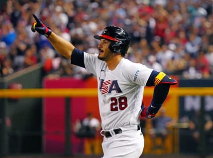 March 11, 2023; Phoenix, Ariz; USA; USA third baseman Nolan Arenado (28) celebrates getting on base against Great Britain during the World Baseball Classic at Chase Field.

Baseball World Baseball Classic Opening Day