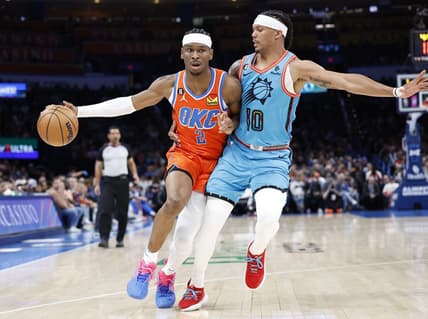 Mar 19, 2023; Oklahoma City, Oklahoma, USA; Oklahoma City Thunder guard Shai Gilgeous-Alexander (2) drives against Phoenix Suns guard Damion Lee (10) during the second quarter at Paycom Center. Mandatory Credit: Alonzo Adams-USA TODAY Sports