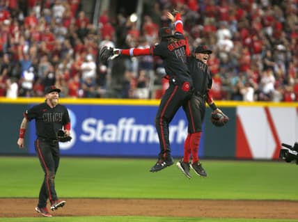 Jun 23, 2023; Cincinnati, Ohio, USA; Cincinnati Reds shortstop Elly De La Cruz (44) celebrates with teammates after they defeated the Atlanta Braves at Great American Ball Park. Mandatory Credit: David Kohl-USA TODAY Sports