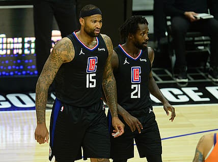 Jun 30, 2021; Los Angeles, California, USA; Los Angeles Clippers center DeMarcus Cousins (15) reacts after a defensive play against the Phoenix Suns during the second half in game six of the Western Conference Finals for the 2021 NBA Playoffs at Staples Center. Mandatory Credit: Gary A. Vasquez-USA TODAY Sports