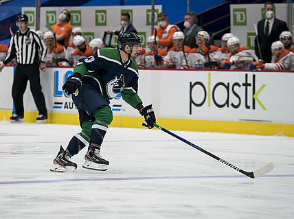 Feb 25, 2021; Vancouver, British Columbia, CAN; Vancouver Canucks forward Jayce Hawryluk  (13) skates against the Edmonton Oilers in the second period at Rogers Arena. Mandatory Credit: Bob Frid-USA TODAY Sports