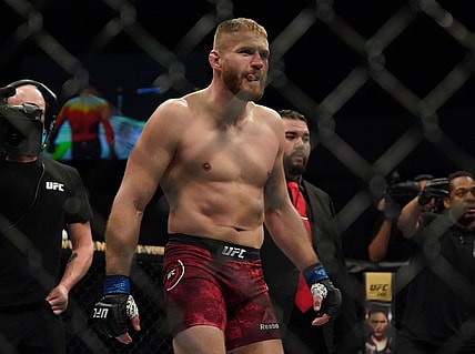 Feb 15, 2020; Rio Rancho, New Mexico, USA; Corey Anderson (red) fights Jan Blachowicz (blue) in the light heavyweight bout during UFC Fight Night at Santa Ana Star Arena. Mandatory Credit: Kirby Lee-USA TODAY Sports