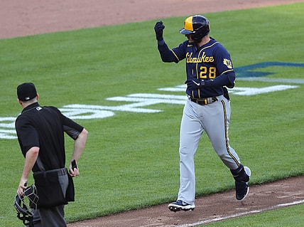 May 22, 2021; Cincinnati, Ohio, USA; Milwaukee Brewers  Daniel Robertson reacts after hitting a solo home run against the Cincinnati Reds during the seventh inning at Great American Ball Park. Mandatory Credit: David Kohl-USA TODAY Sports
