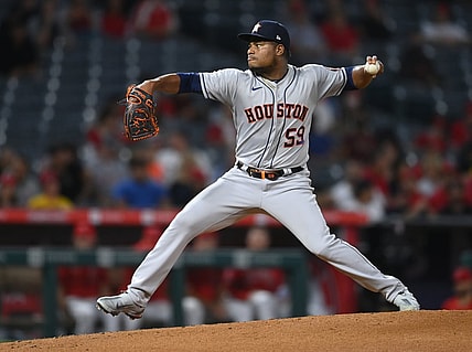 Sep 20, 2021; Anaheim, California, USA;  Houston Astros starting pitcher Framber Valdez (59) throws in the second inning of the game against the Los Angeles Angels at Angel Stadium. Mandatory Credit: Jayne Kamin-Oncea-USA TODAY Sports