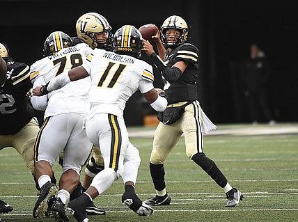 Oct 30, 2021; Nashville, Tennessee, USA; Vanderbilt Commodores quarterback Mike Wright (5) attempts a pass during the first half against the Missouri Tigers at Vanderbilt Stadium. Mandatory Credit: Christopher Hanewinckel-USA TODAY Sports