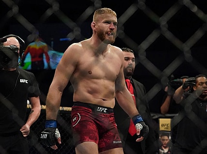 Feb 15, 2020; Rio Rancho, New Mexico, USA; Corey Anderson (red) fights Jan Blachowicz (blue) in the light heavyweight bout during UFC Fight Night at Santa Ana Star Arena. Mandatory Credit: Kirby Lee-USA TODAY Sports