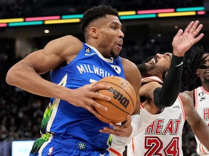 Bucks forward Giannis Antetokounmpo collides with Heat guard Gabe Vincent on a drive to the rim during the second half Saturday night at Fiserv Forum.

Mjs Bucks04 11 Jpg Bucks04