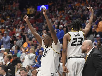 Mar 10, 2023; Nashville, TN, USA;  Missouri Tigers forward Mohamed Diarra (0) and forward Aidan Shaw (23) celebrate the win against the Tennessee Volunteers during the second half at Bridgestone Arena. Mandatory Credit: Steve Roberts-USA TODAY Sports