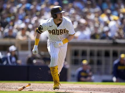 Apr 15, 2023; San Diego, California, USA;  San Diego Padres second baseman Jake Cronenworth (9) hits a two run home run against the Milwaukee Brewers during the fifth inning at Petco Park. Mandatory Credit: Ray Acevedo-USA TODAY Sports