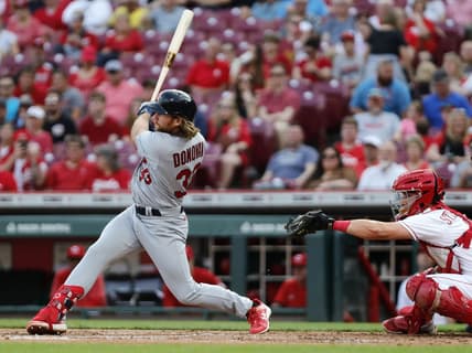 May 23, 2023; Cincinnati, Ohio, USA; St. Louis Cardinals first baseman Brendan Donovan (33) hits a single against the Cincinnati Reds during the second inning at Great American Ball Park. Mandatory Credit: David Kohl-USA TODAY Sports