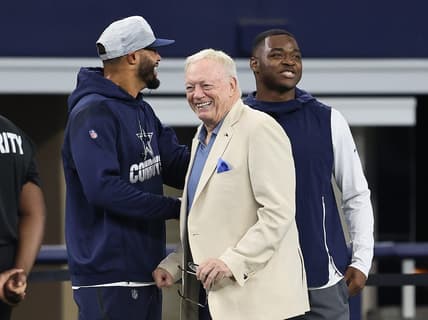 Aug 29, 2021; Arlington, Texas, USA; Dallas Cowboys quarterback Dak Prescott , owner Jerry Jones and receiver Amari Cooper talk prior to the game against the Jacksonville Jaguars at AT&T Stadium. Mandatory Credit: Matthew Emmons-USA TODAY Sports