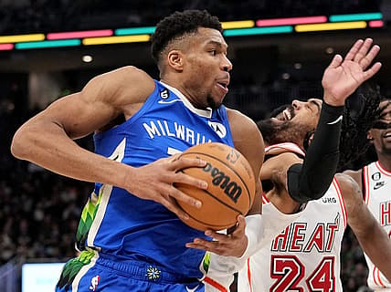 Bucks forward Giannis Antetokounmpo collides with Heat guard Gabe Vincent on a drive to the rim during the second half Saturday night at Fiserv Forum.

Mjs Bucks04 11 Jpg Bucks04