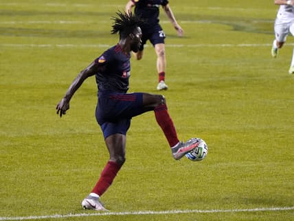 Oct 11, 2020; Chicago, Illinois, USA; Chicago Fire forward C.J. Sapong (9) traps the ball against D.C. United during the first half at Soldier Field. Mandatory Credit: Mike Dinovo-USA TODAY Sports
