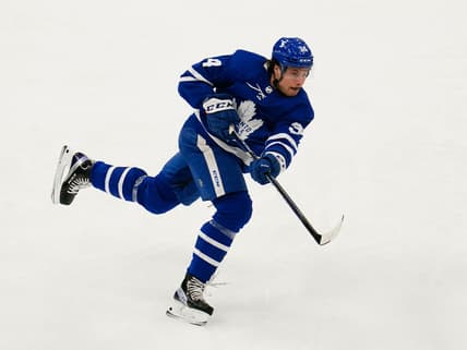Apr 7, 2021; Toronto, Ontario, CAN; Toronto Maple Leafs forward Auston Matthews (34) shoots the puck against the Montreal Canadiens during the first period at Scotiabank Arena. Mandatory Credit: John E. Sokolowski-USA TODAY Sports