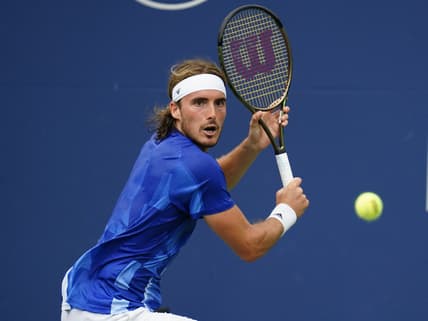 Aug 13, 2021; Toronto, Ontario, Canada; Stefanos Tsitsipas of Greece returns a ball to Casper Ruud of Norway  (not pictured) at Aviva Centre. Mandatory Credit: John E. Sokolowski-USA TODAY Sports