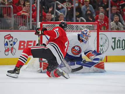 Oct 19, 2021; Chicago, Illinois, USA; New York Islanders goaltender Ilya Sorokin (30) makes a save on a shot from Chicago Blackhawks defenseman Seth Jones (4) during the first period at the United Center. Mandatory Credit: Dennis Wierzbicki-USA TODAY Sports