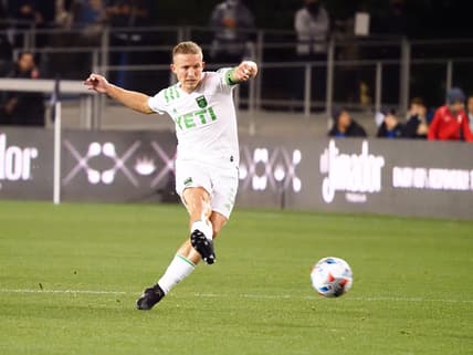 Oct 20, 2021; San Jose, California, USA; Austin FC midfielder Alex Ring (8) passes the ball against the San Jose Earthquakes during the first half at PayPal Park. Mandatory Credit: Kelley L Cox-USA TODAY Sports