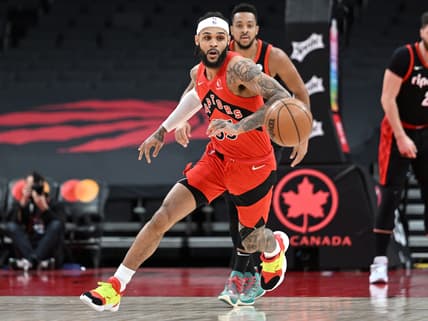 Jan 23, 2022; Toronto, Ontario, CAN;  Toronto Raptors guard Gary Trent Jr. (33) pursues a loose ball against Portland Trail Blazers in the first half at Scotiabank Arena. Mandatory Credit: Dan Hamilton-USA TODAY Sports
