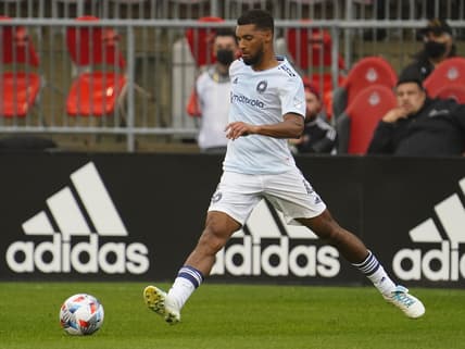 Oct 3, 2021; Toronto, Ontario, CAN; Chicago Fire defender Johan Kappelhof (4) passes the ball against Toronto FC during the first half at BMO Field. Mandatory Credit: John E. Sokolowski-USA TODAY Sports