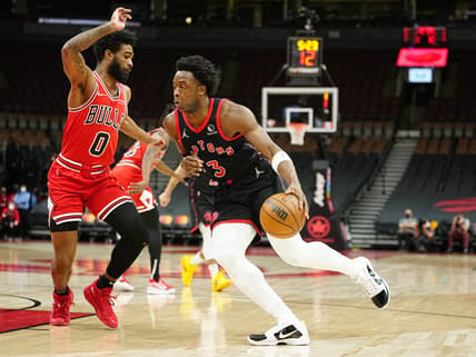 Feb 3, 2022; Toronto, Ontario, CAN; Toronto Raptors forward OG Anunoby (3) drives to the net against Chicago Bulls guard Coby White (0) during the first quarter at Scotiabank Arena. Mandatory Credit: John E. Sokolowski-USA TODAY Sports