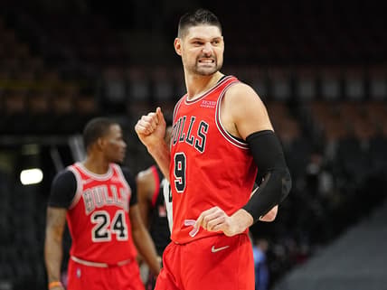Feb 3, 2022; Toronto, Ontario, CAN; Chicago Bulls center Nikola Vucevic (9) reacts after a play against the Toronto Raptors during the second half at Scotiabank Arena. Mandatory Credit: John E. Sokolowski-USA TODAY Sports