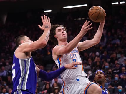 Feb 5, 2022; Sacramento, California, USA; Oklahoma City Thunder guard Josh Giddey (3) goes for a layup against Sacramento Kings center Alex Len (25) during the second quarter at Golden 1 Center. Mandatory Credit: Kelley L Cox-USA TODAY Sports