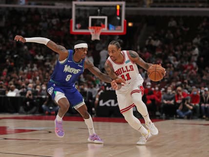 Feb 11, 2022; Chicago, Illinois, USA; Chicago Bulls forward DeMar DeRozan (11) drives around Minnesota Timberwolves forward Jarred Vanderbilt (8) during the first quarter at the United Center. Mandatory Credit: Dennis Wierzbicki-USA TODAY Sports