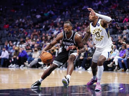 Nov 7, 2021; Sacramento, California, USA; Sacramento Kings forward Harrison Barnes (40) drives in against Indiana Pacers forward Torrey Craig (13) during the second quarter at Golden 1 Center. Mandatory Credit: Kelley L Cox-USA TODAY Sports