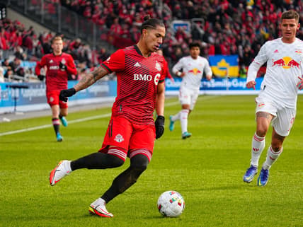Mar 5, 2022; Toronto, Ontario, CAN; Toronto FC defender Carlos Salcedo (3) dribbles the ball against New York Red Bulls at BMO Field. Mandatory Credit: John E. Sokolowski-USA TODAY Sports