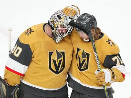 Apr 9, 2022; Las Vegas, Nevada, USA; Vegas Golden Knights center William Karlsson (71) congratulates goaltender Robin Lehner (90) after defeating the Arizona Coyotes at T-Mobile Arena. Mandatory Credit: Stephen R. Sylvanie-USA TODAY Sports