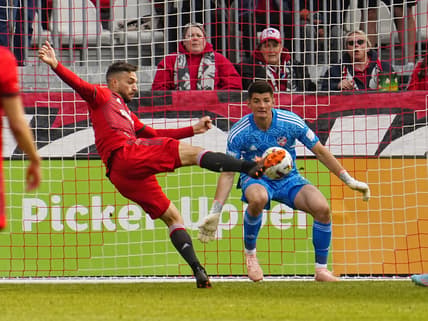 Apr 30, 2022; Toronto, Ontario, CAN; Toronto FC forward Jesus Jimenez (9) scores on FC Cincinnati goalkeeper Roman Celentano (18) during the second half at BMO Field. Mandatory Credit: John E. Sokolowski-USA TODAY Sports